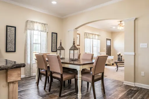 The Chambord is a beautiful home with French country details like crown molding and arched entryways.