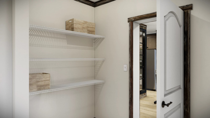 Pantry off of dining area with shelves