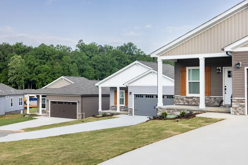 Harvest Meadow neighborhood in Knoxville, TN featuring three CrossMod homes with porches