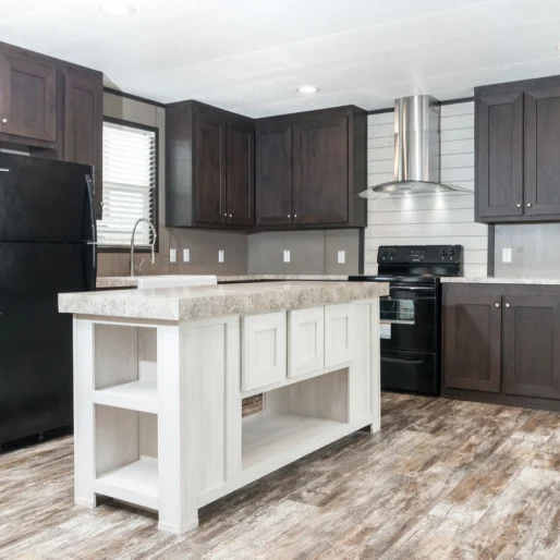 Offering gorgeous wood cabinetry, stainless steel range hood and sleek countertops, the [model name] hosts a beautiful and functional kitchen space.