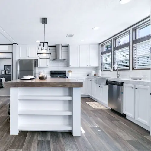 Words cannot describe how beautiful, sleek, modern and unique this Absolute Value all white kitchen style is.