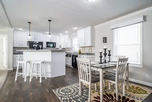 The Tucson features a kitty-cornered kitchen island that creates a clear divide between the rooms in your home while still letting you enjoy an open floor plan.