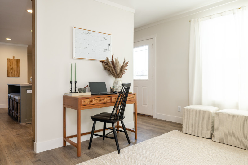 A flex room in a manufactured home with a desk and chair