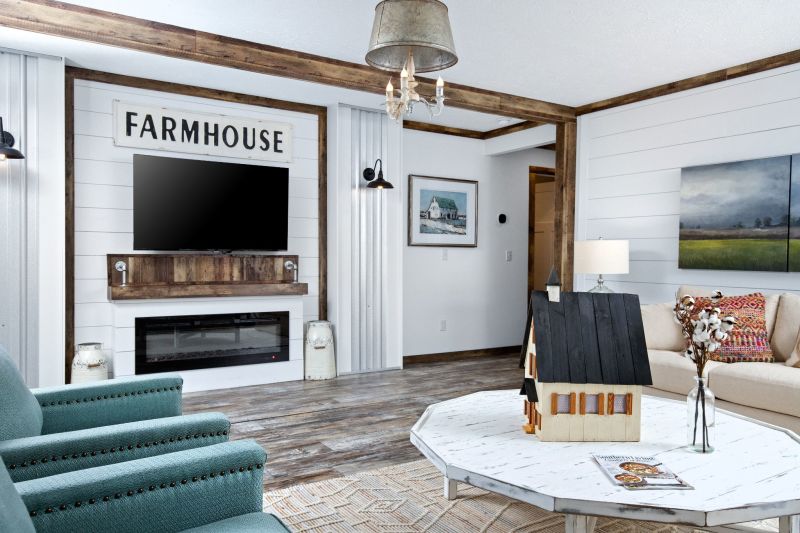 living room with shiplap on walls and natural wood trim