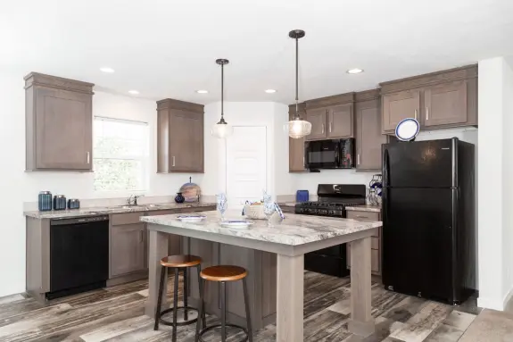 If you're dreaming of additional pantry space for all of your special ingredients and treats, the large pantry in the Somerset DR 5228-MS012 Sect is a must see! 