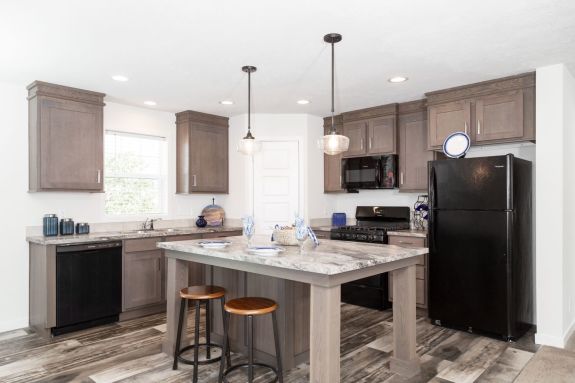 If you're dreaming of additional pantry space for all of your special ingredients and treats, the large pantry in the Somerset DR 5228-MS012 Sect is a must see! 