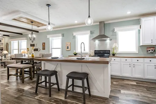 The Classic 56D features a farmhouse style kitchen island, a coffered ceiling and a spacious open floor plan that's perfect for hosting family and friends.