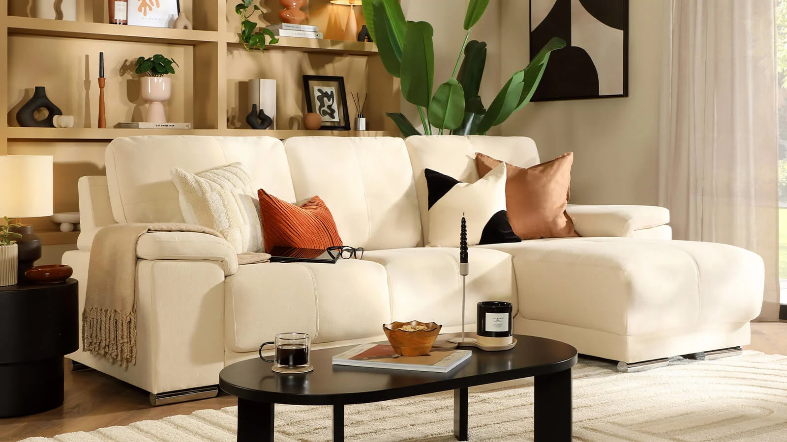 banner-fabric-vs-leather-sofa-1600x900
