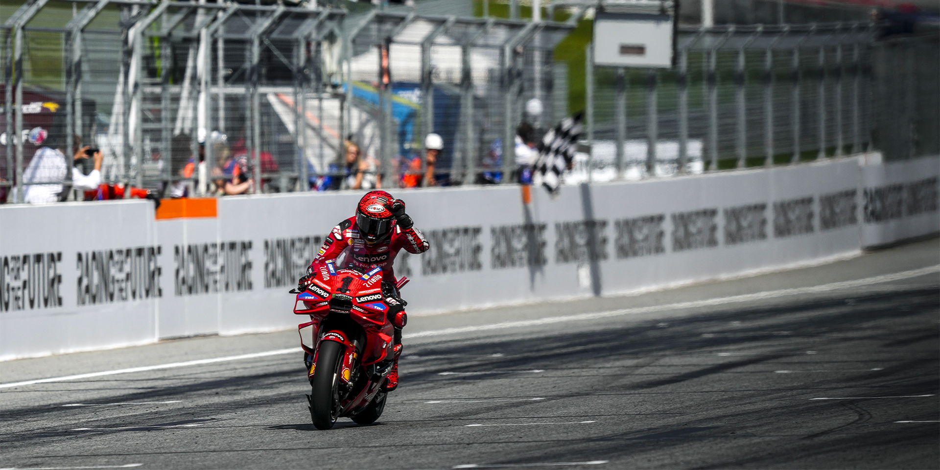 Francesco Bagnaia and the Ducati Lenovo Team atop the podium in ...