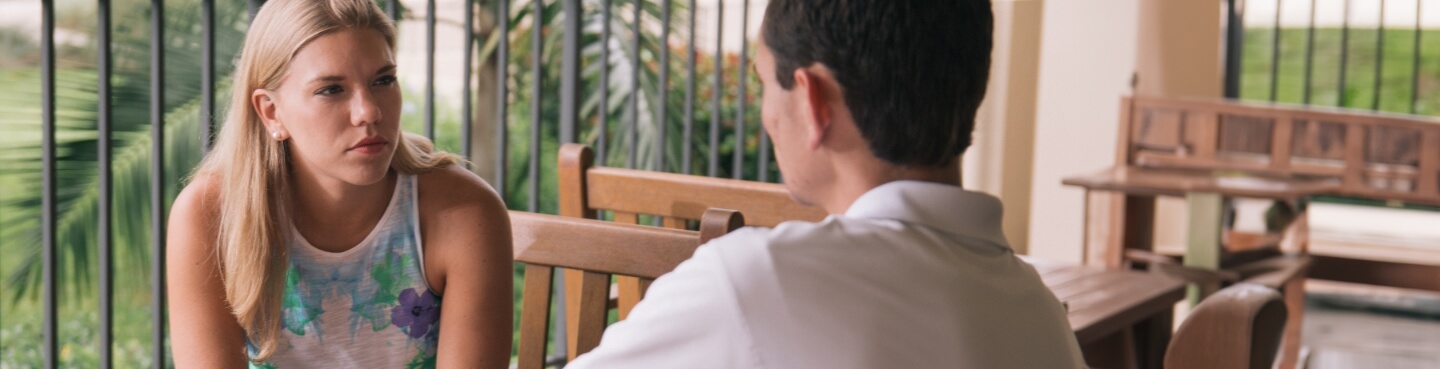 psychology professional meeting with a patient outside