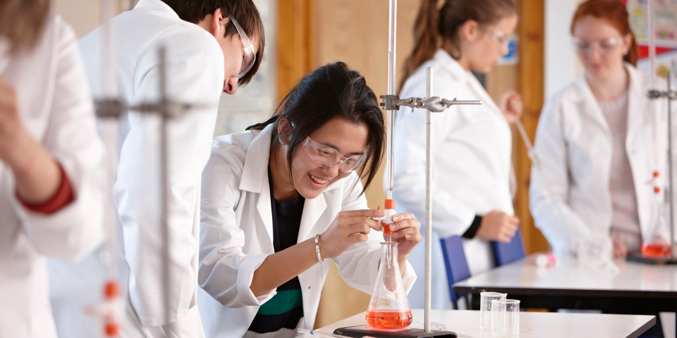 Students in chemistry lab, titration experiment