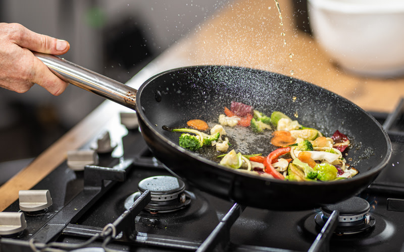 Vegetables sauteed in ACH Food cooking oil 