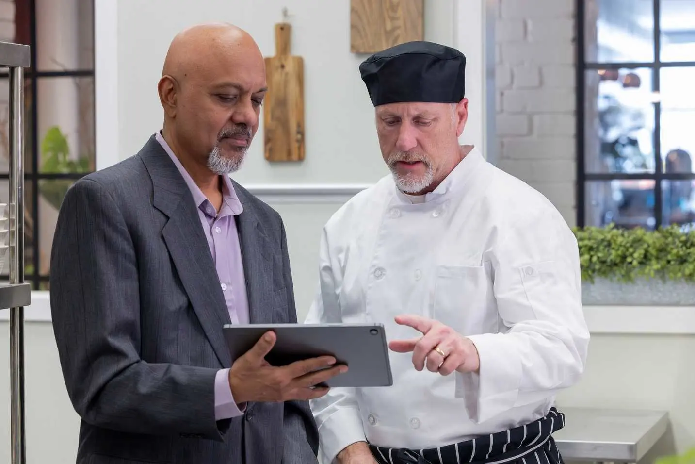 A foodservice manufacturer discussing sales of products in a restaurant chain.

