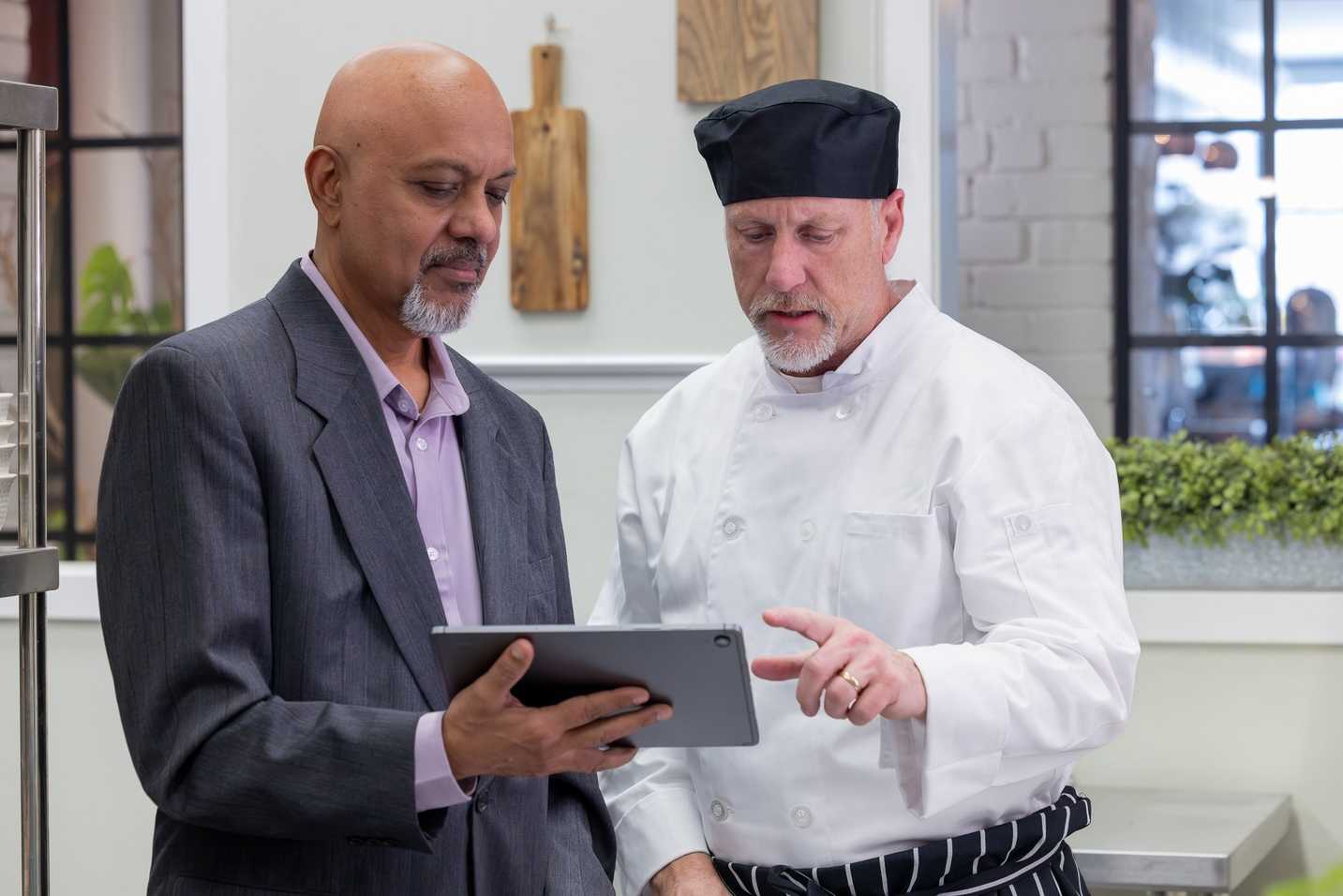 A foodservice manufacturer discussing sales of products in a restaurant chain.

