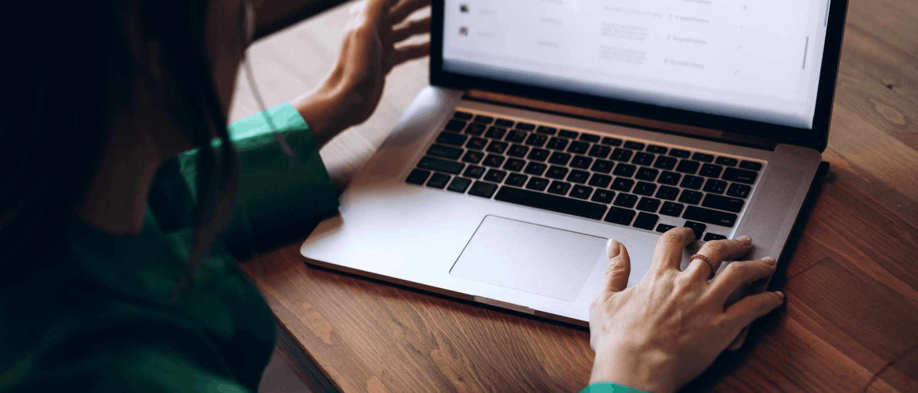 a business person using the AI assistant on a laptop