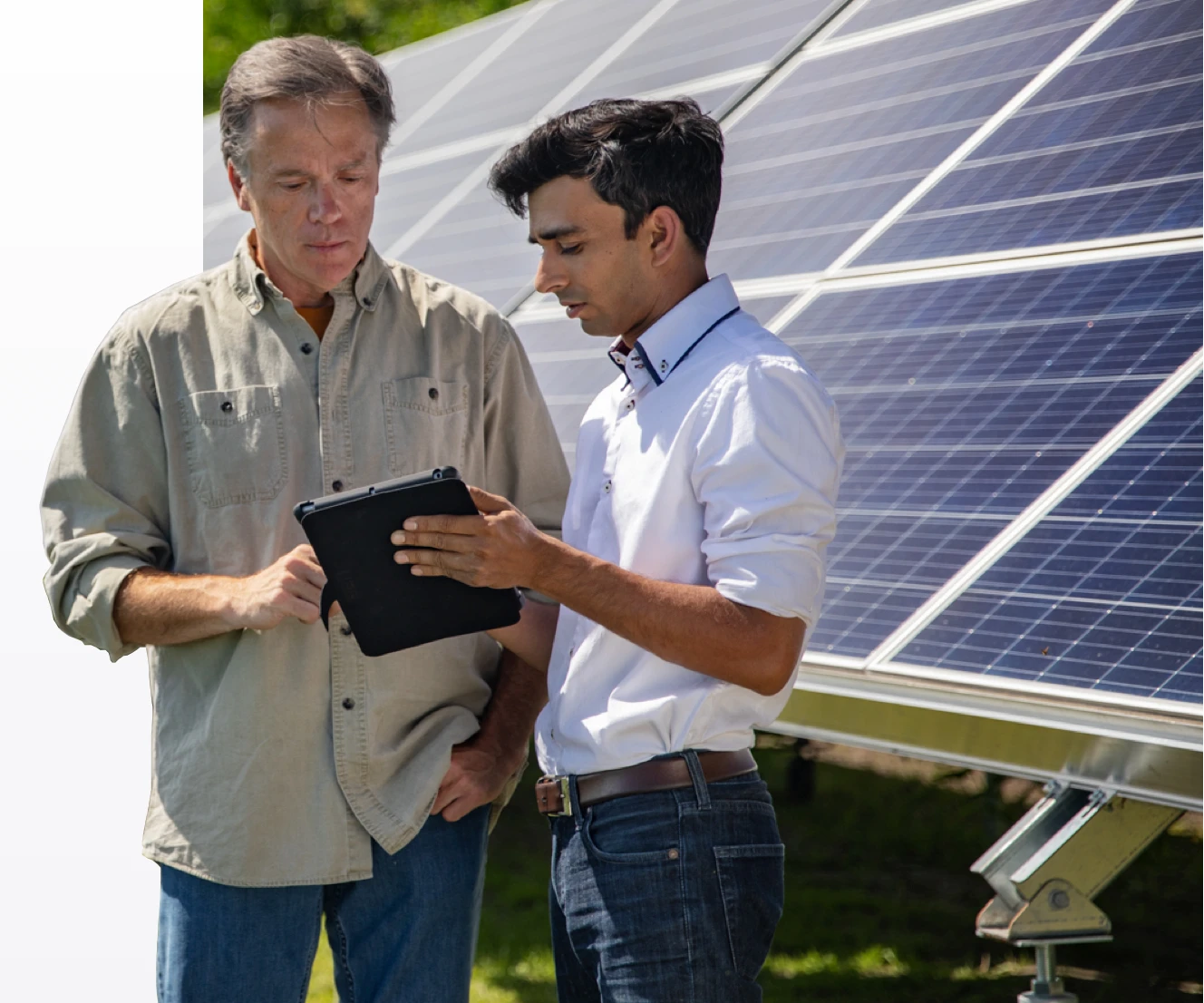 Two men discussing solar energy