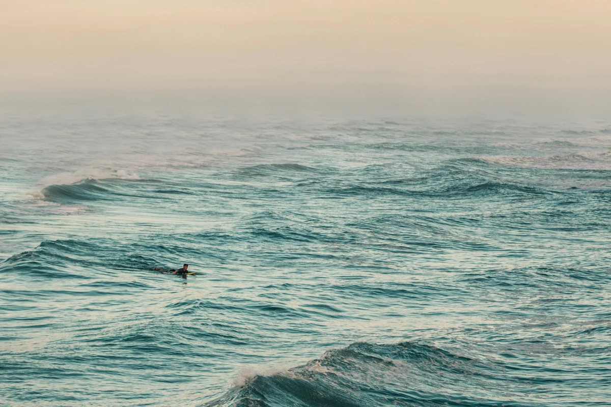 A person surfing near Daytona Beach, Florida