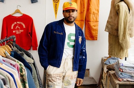A man standing in a clothing store