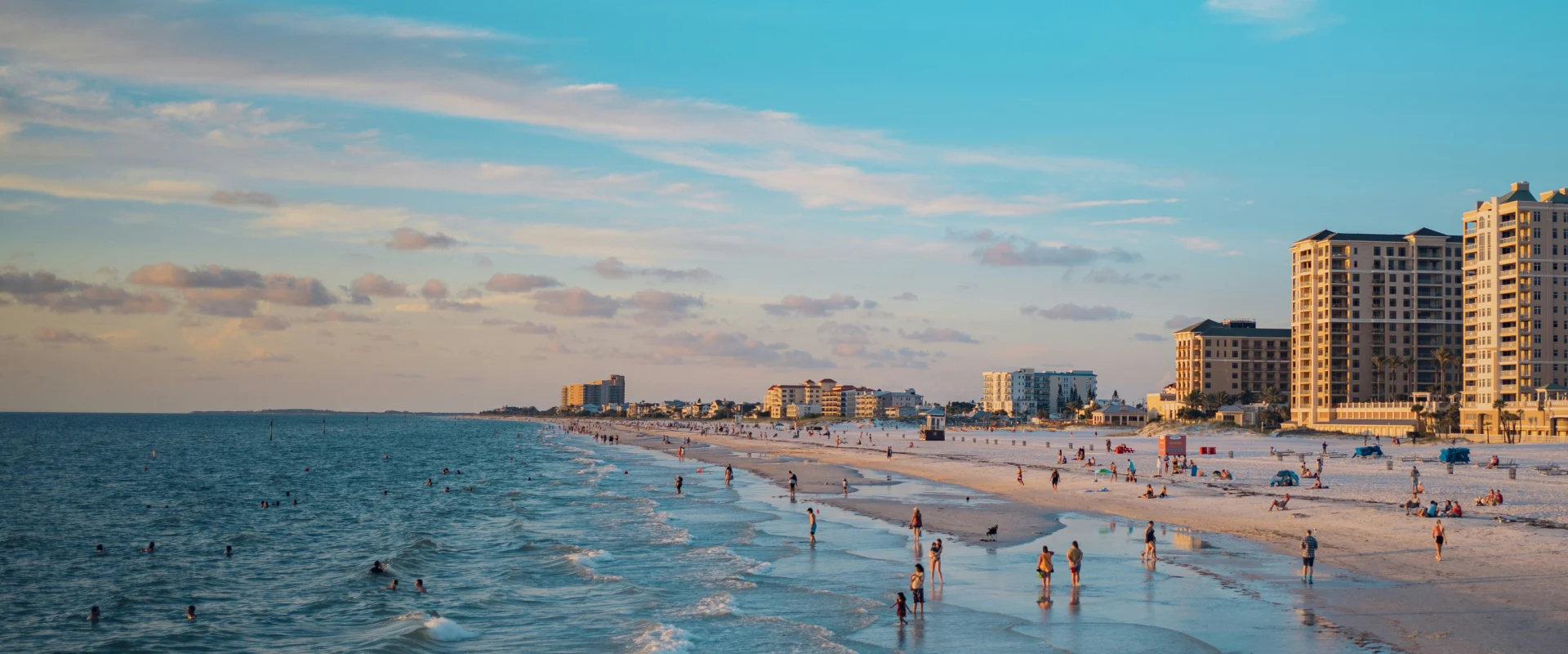 White sand beach and calm Gulf water at sunset near Tampa Florida