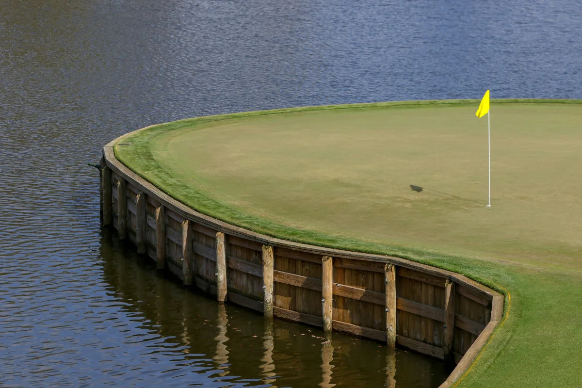 Golf course island green surrounded by water