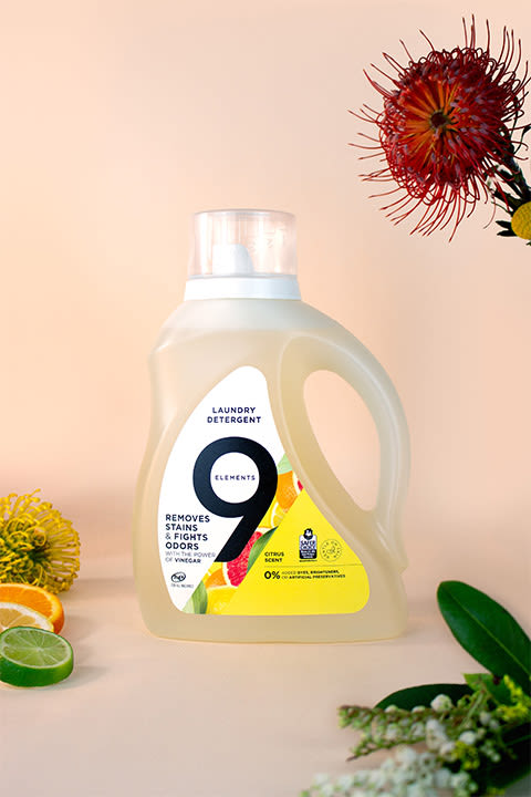 9 Elements citrus laundry detergent bottle.