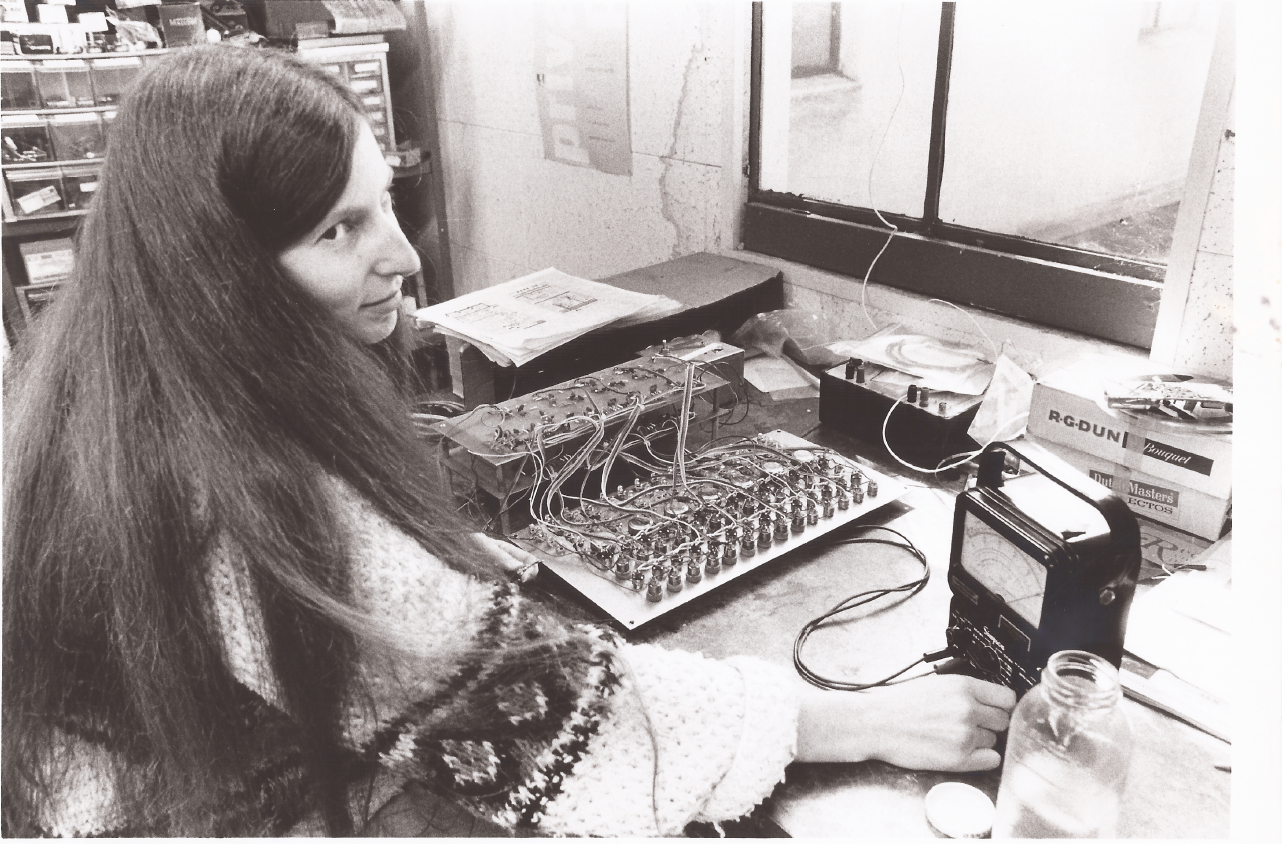 Maggi Payne testing wiring in the CCM tech room mid-70s.