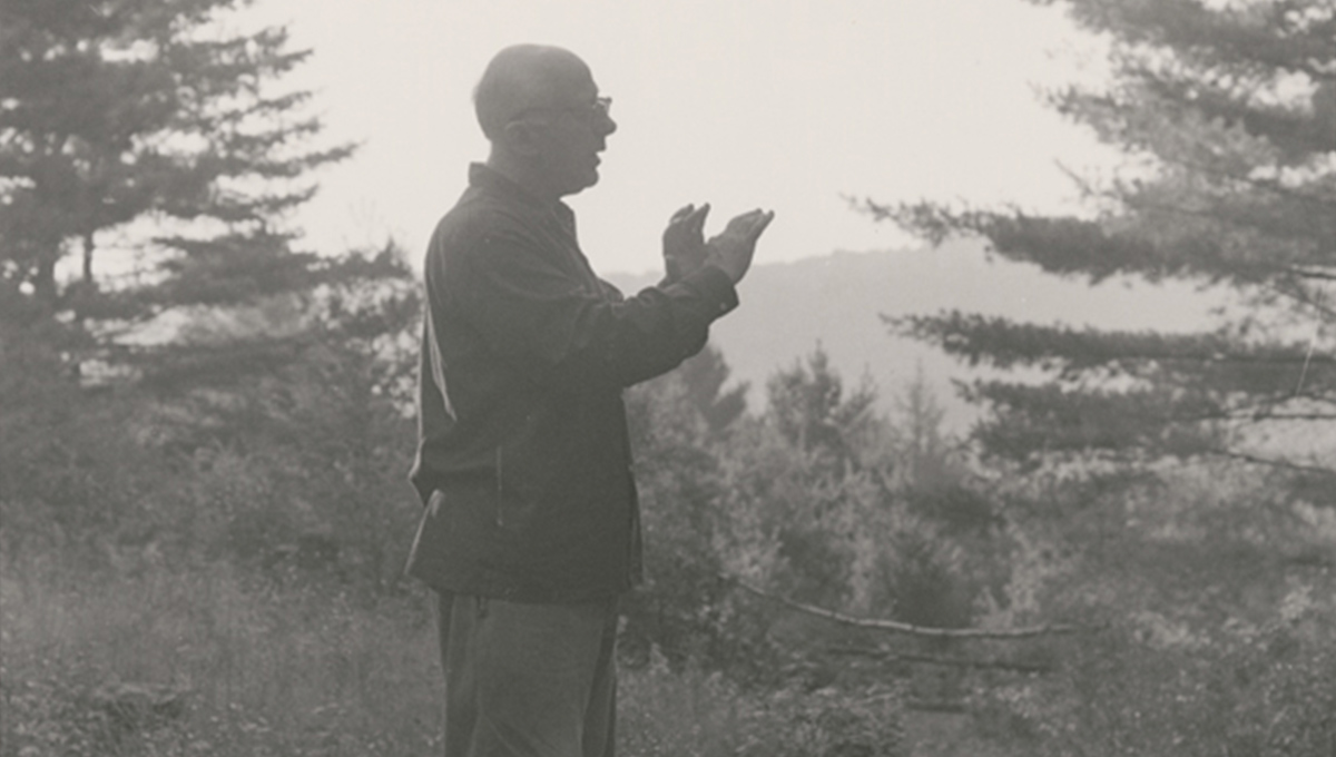 Cowell conducting outdoors towards the end of his life.