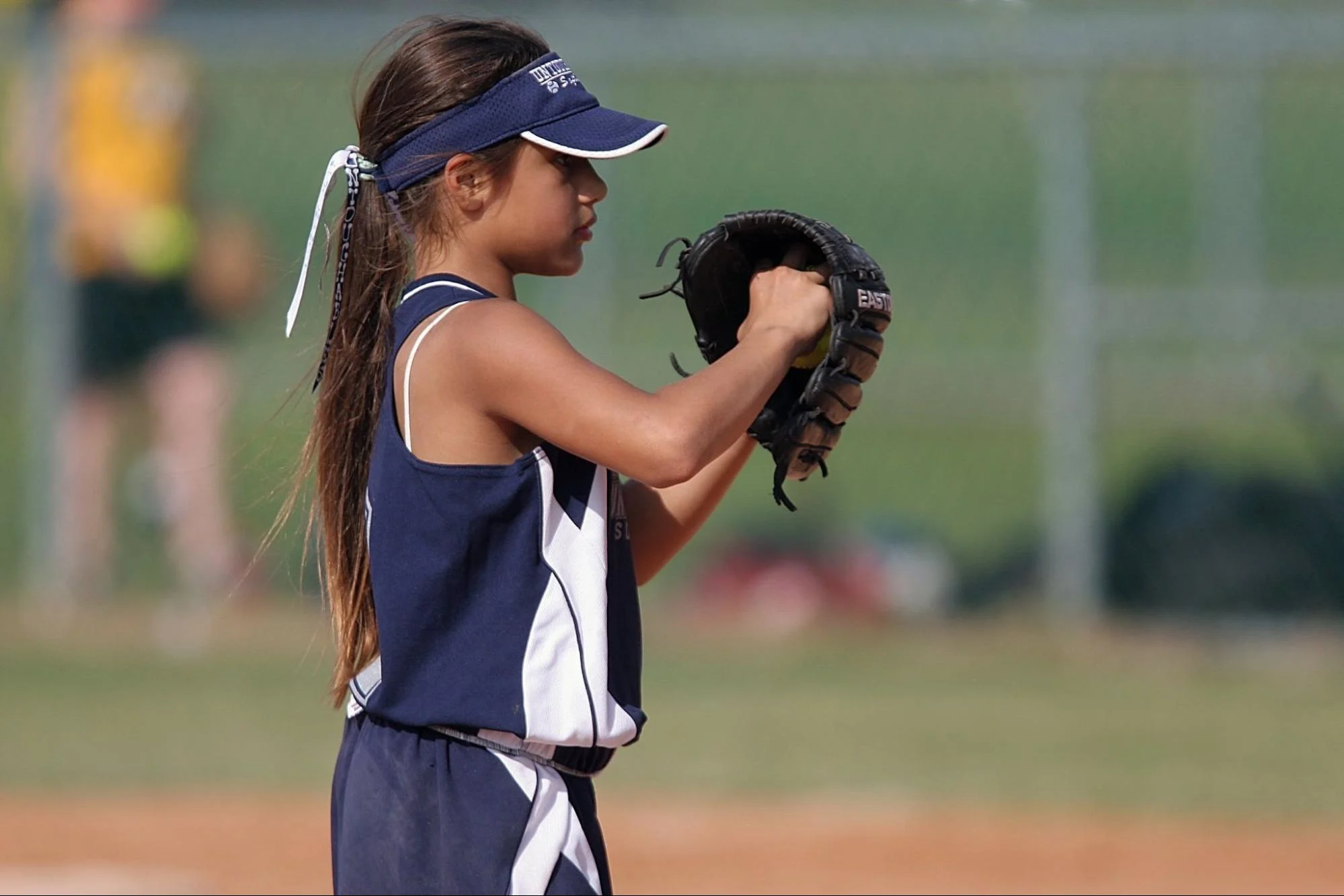 a youth softball pitcher