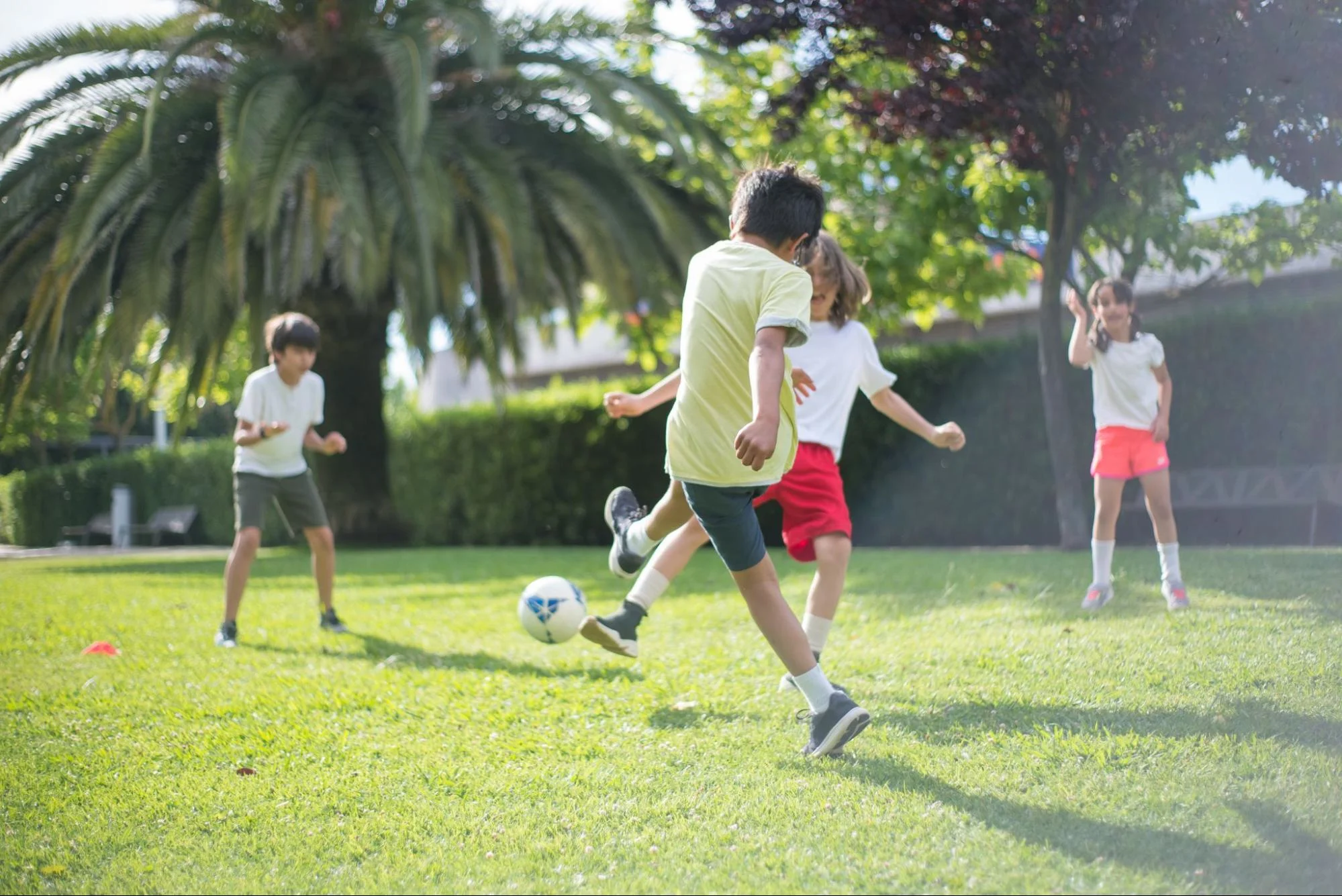 youth soccer players playing pickup soccer