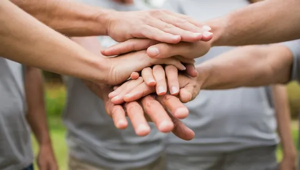 youth sports volunteers teaming up