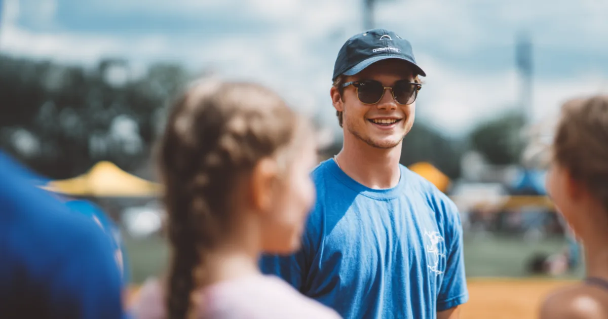 Youth sports volunteer at practice