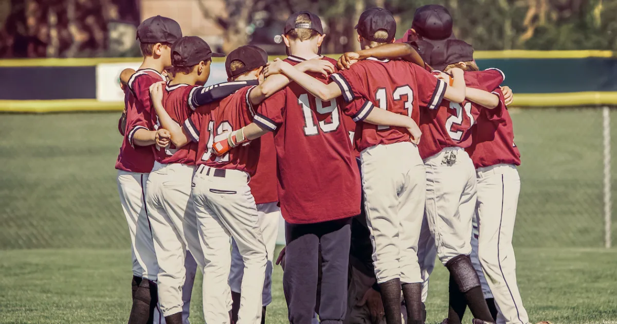 a youth baseball team getting ready for a game