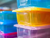 Colourful plastic containers stacked