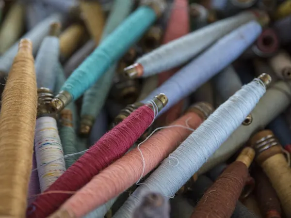 Assorted colour thread spools