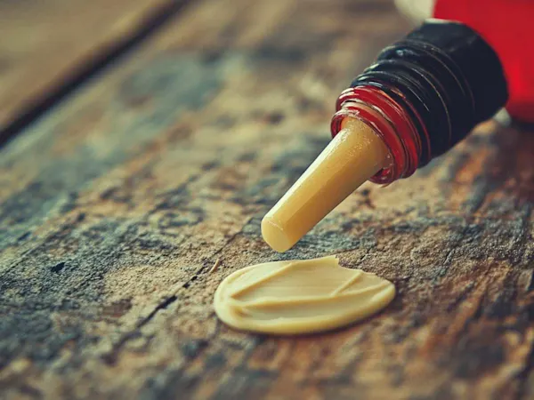 Glue spilling out of tube