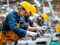 Factory workers on manufacturing line