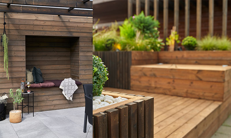 Koselig treinnfelt sittehule med puter, pledd, småbord og grønne planter på treterrasse.