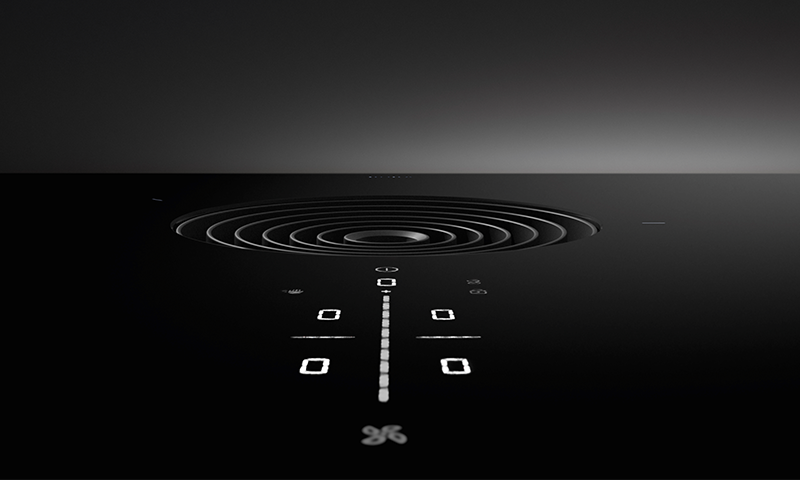 Svart glaskeramisk koketopp med integrert sirkulær uttrekksventil og lyse LED-symboler.