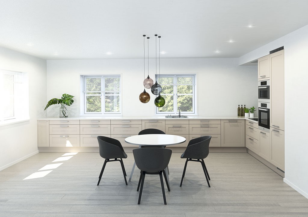 Lyst minimalistisk kjøkken med beige skap, rundt bord med fire svarte stoler og fargerike lamper