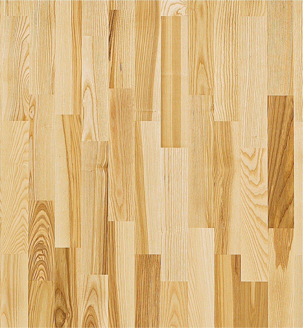 Nærbilde av lyst eikeparkettgulv med naturlige årer og varierende plankemønster.