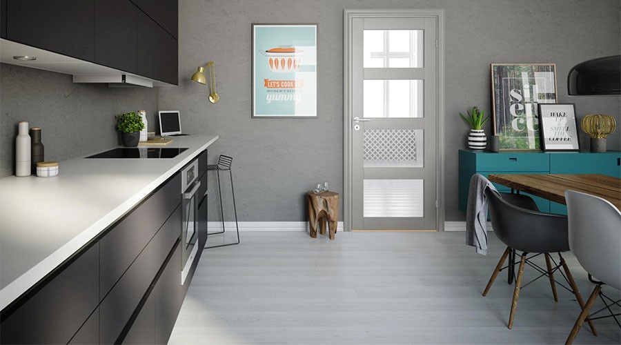 Moderne kjøkken med svarte skap, hvit benkeplate, grå vegg, turkis skjenk og spisebord.