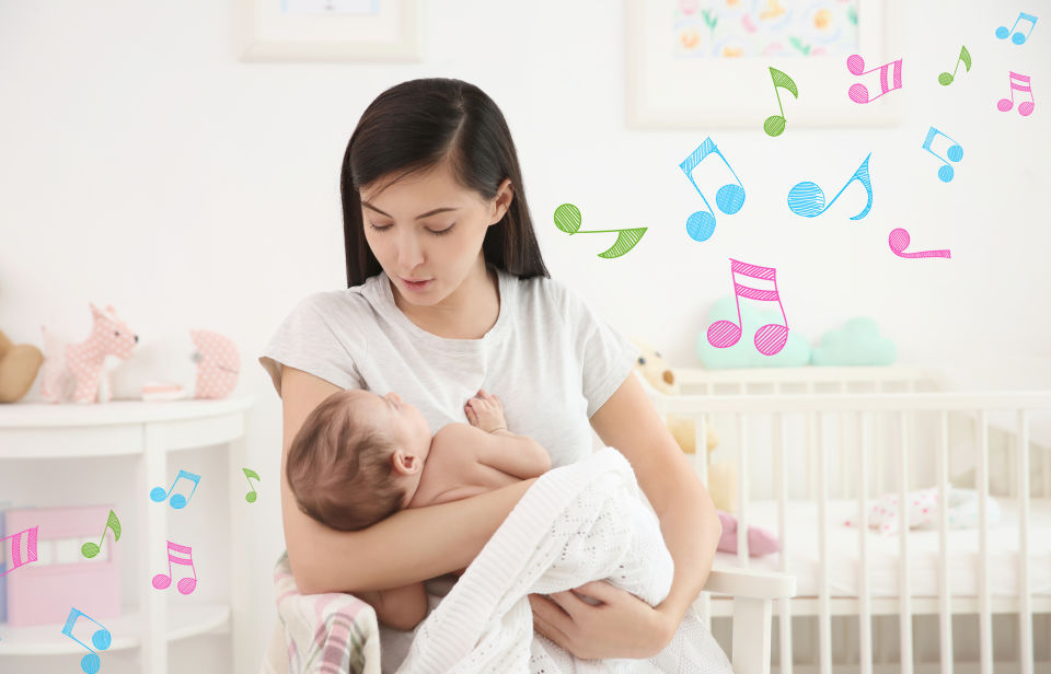 Mom singing to baby.