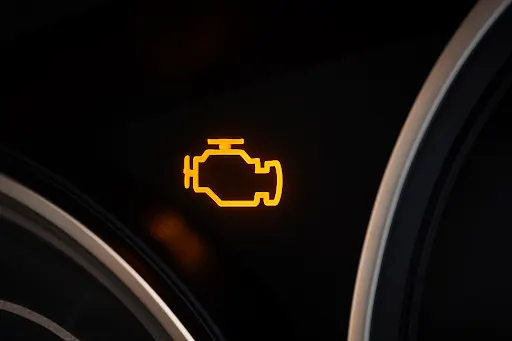 Check engine management warning light Engine management warning light on car dashboard