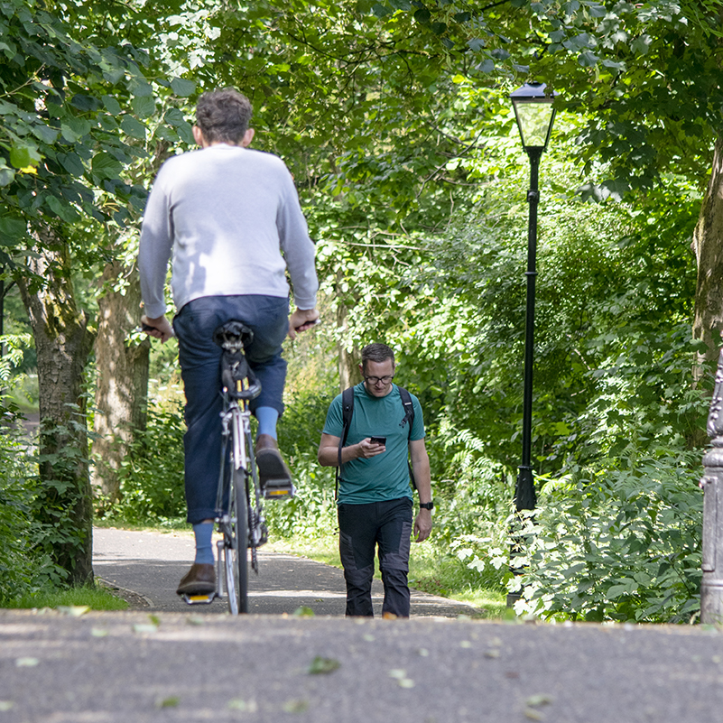 Two people using the improved path in Bramhall Park