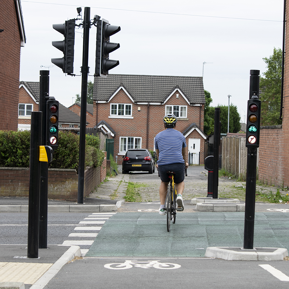 Person on a bike using a new segregated crossing facility
