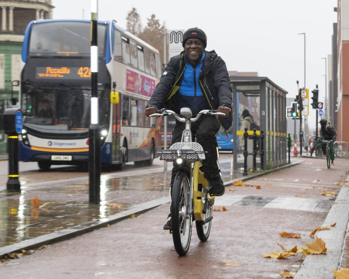Cyclist using cycle hire scheme along Oxford Road