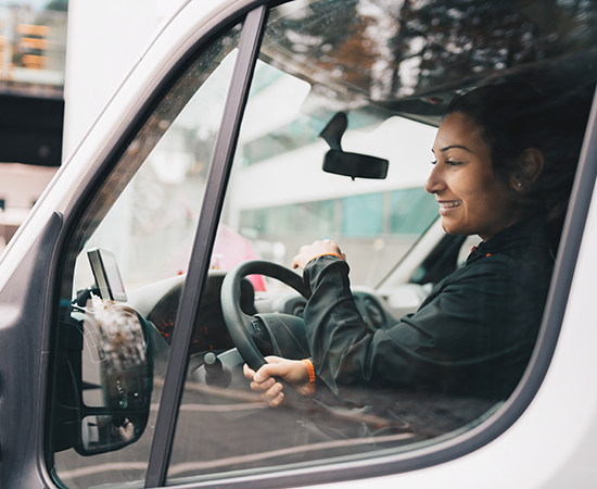 A person driving a vehicle