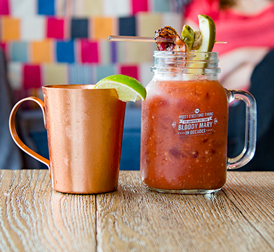 Moscow Mule and Bloody Mary on a table in the lounge area at PJ's