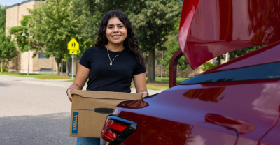 College student unloading car