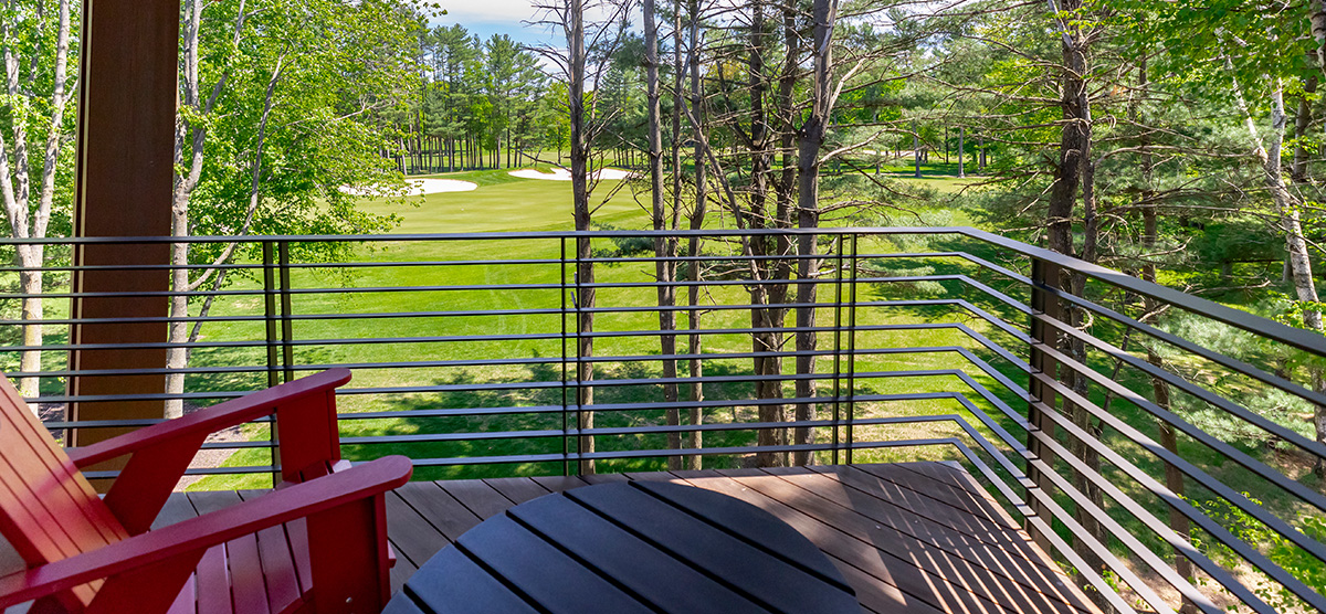 carousel-suite-golf-view-queen-7-1200x556 Outside terrace overlooking a golf course